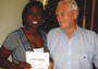 Don Huff donates his winnings in the weekly raffle to BBBS Rhonda Staley-Brooks who provided the program for the meeting.